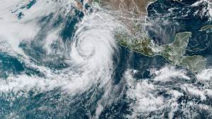 What are the differences between a tropical depression, tropical storm, and hurricane?
